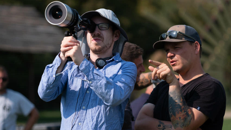 Ari Aster with cinematographer Pawel Pogorzelski on the set of Midsommar.